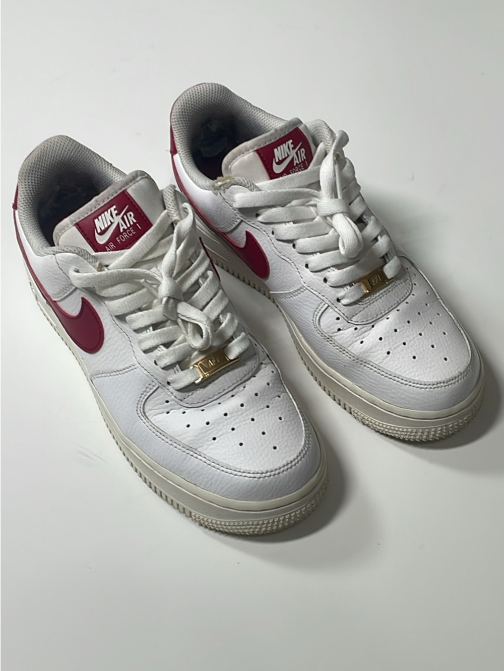 Nike White Sneakers with Red Swoosh and Red Inner Lining